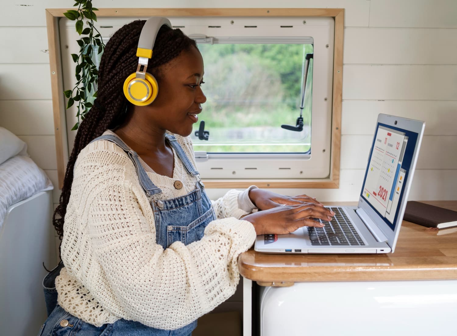A learner working through the Tecterminal curriculum on a laptop